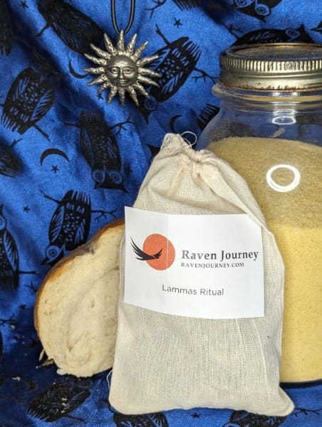 A jar of tea and some other items on a table.